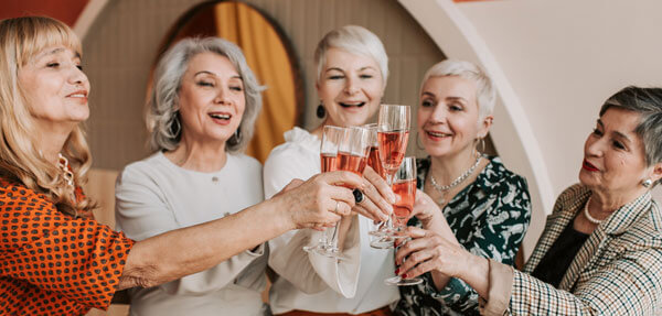 group of women drinking champagne